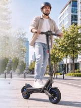 SUNNIGOO G7 ABE electric scooter being ridden on a city street by an adult commuter